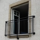 Repaired window balcony and bannister